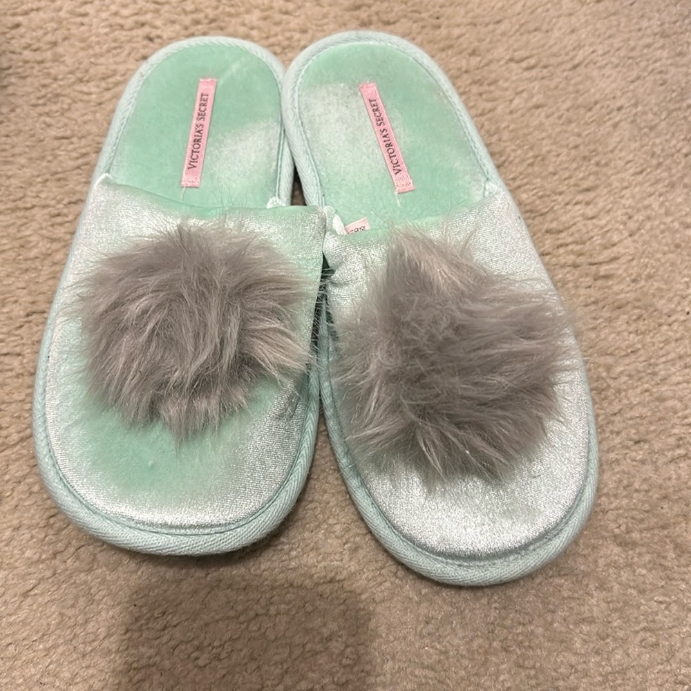 Victoria’s Secret house slippers with gray pom-pom in seafoam green